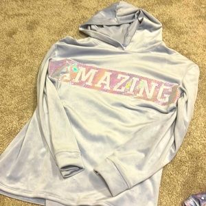 Soft velvet hoodie with “Amazing”written across the front